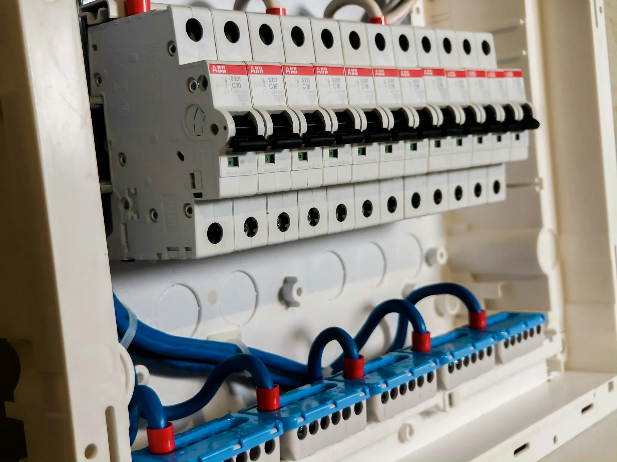 Neatly labelled rows of breakers in a modern panel